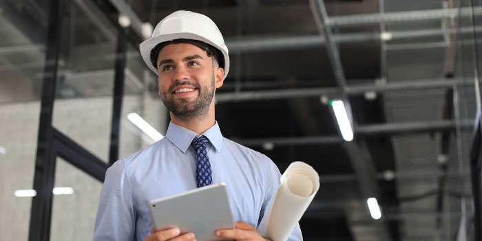 iStock young male engineer on factory floor