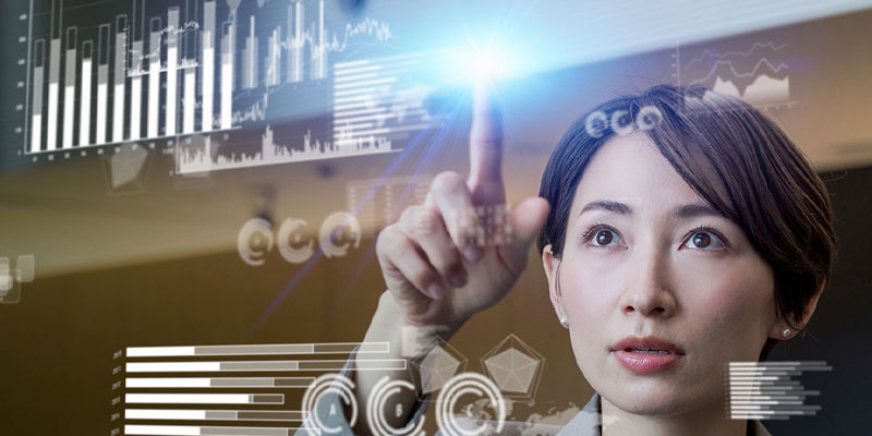 Young woman on touchscreen dimensional monitor